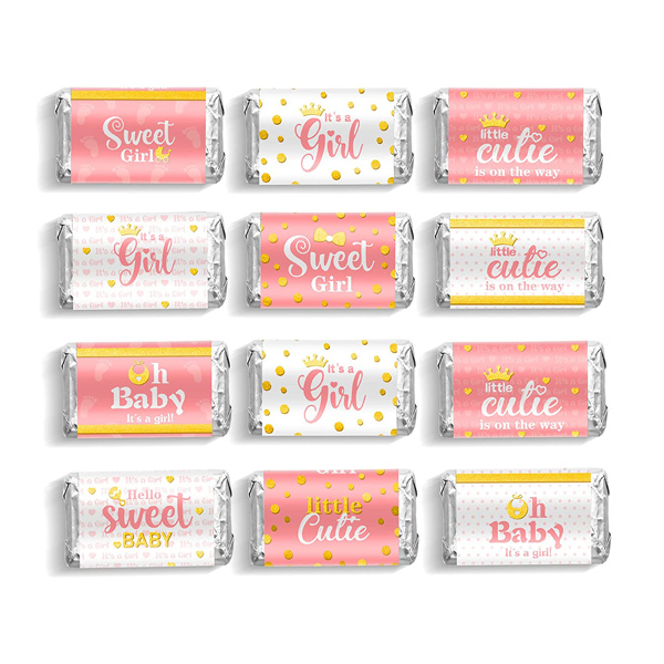 Small pieces of candy wrapped in wrappers that say "Sweet girl," "It's a girl," "Hello sweet baby," and "Oh baby it's a girl!"