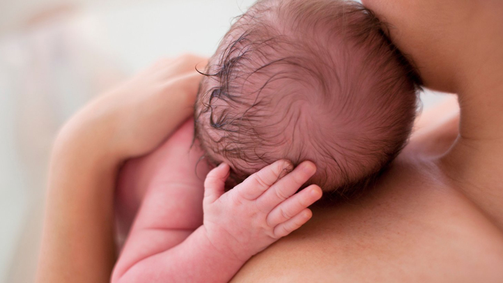 baby soft spot, newborn baby on mother's chest