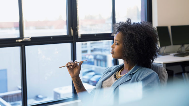 emotional woman at work after returning from maternity leave