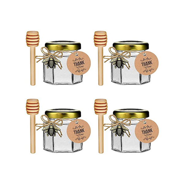 Four mini hexagonal honey jars with wooden dipper, bee charm, gold lid and thank you tag