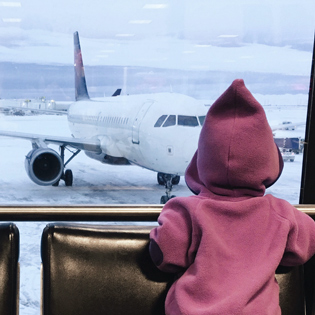 11 Tips to Make Flying With a Toddler Go More Smoothly