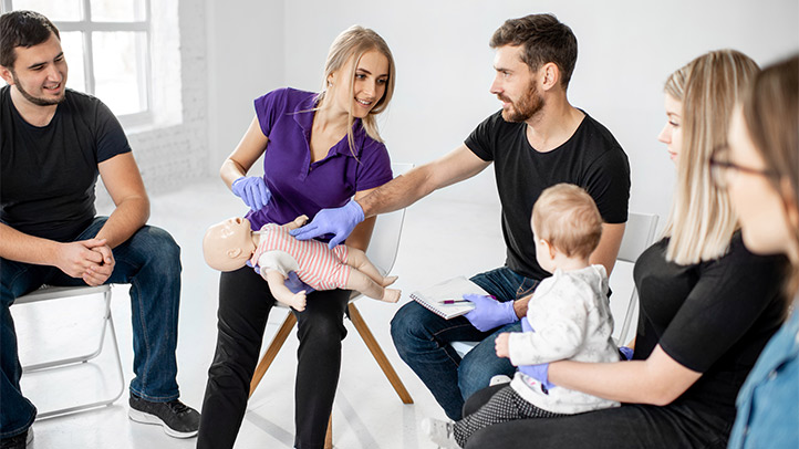 infant and child cpr, parents attending a child cpr class