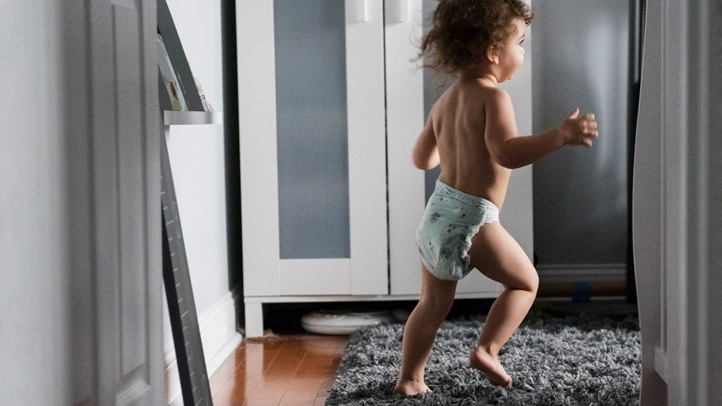 potty training regression, child in diapers running