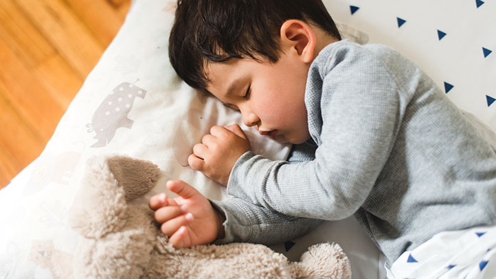 toddler sleeping in bed, safe sleep practices for toddlers