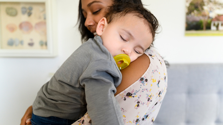 toddler sleepwalking, mom carrying sleeping toddler